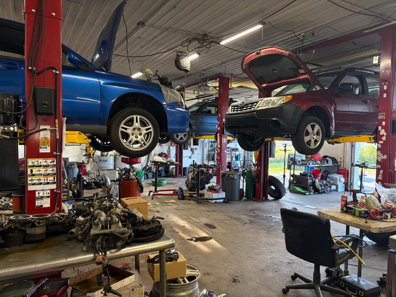 Boxer Automotive shop floor with Subarus on lifts